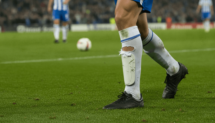 AI-generated image: Why Do Footballers Tear Their Socks?